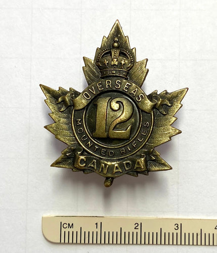 12 Canadian Mounted Rifles cap badge
