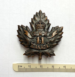 11 Canadian Mounted Rifles cap badge